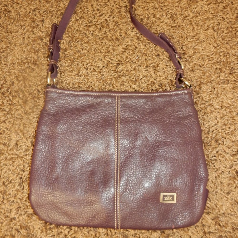 Sak, leather purse